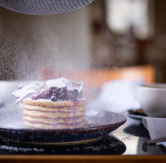 Brunch - Stack of pancakes with berry compote, icing sugar - The Crown at Woodbridge